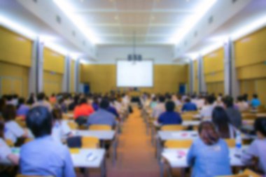 Arka plan bulanık, iş toplantı konferans eğitim öğrenme koçluk seyirci kavramı.