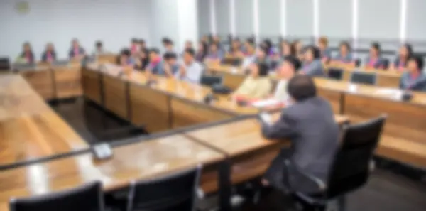 Üzleti ülésén konferencia tanulás Coaching közönség oktatásában, Blurred háttér — Stock Fotó