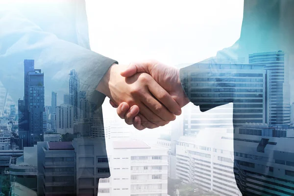 handshake of businessman, double exposure, business technology and Social Network concept