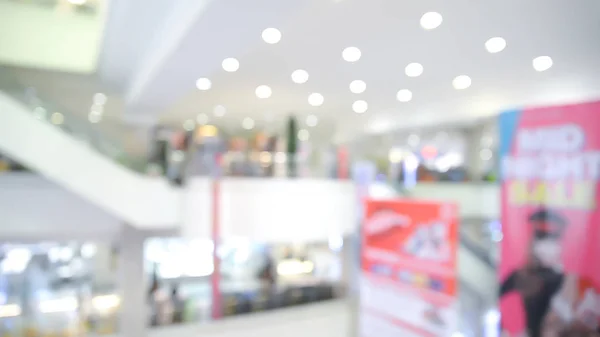 Blurred of people walking in shopping mall, blurred bokeh background — Stock Photo, Image