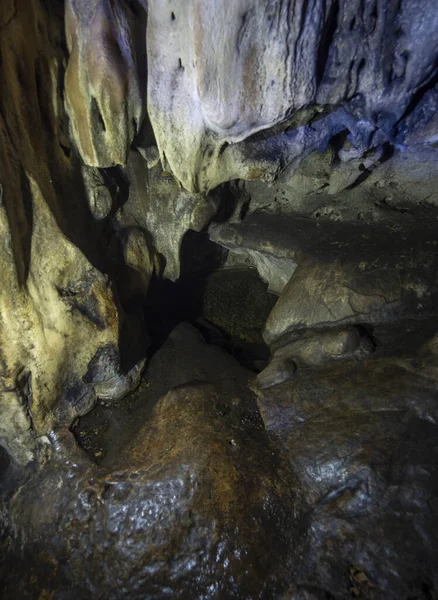 View and texture of the inner walls of a mountain cave with stalactites and stalagmites in the Dirfys mountains on the Greek island of Evia, Greece