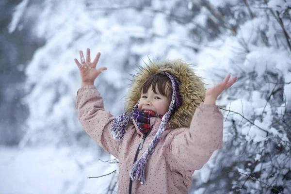Very happy child enjoy first snow