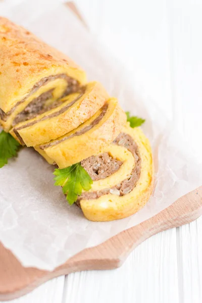 Egg rolls with meat on a white background