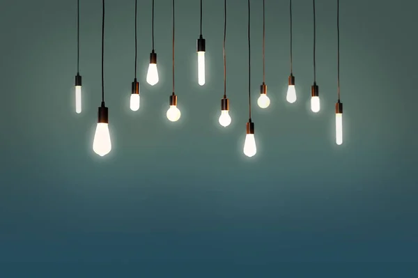 Ampoules Électriques Une Lumière Comme Concept Couleur Fond Brun — Photo