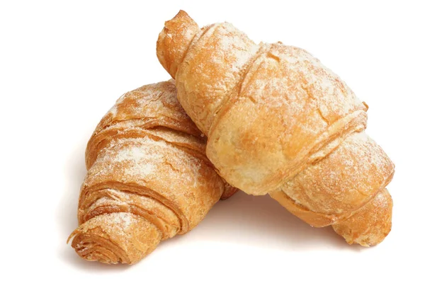 Croissant fresco isolato su bianco — Foto Stock