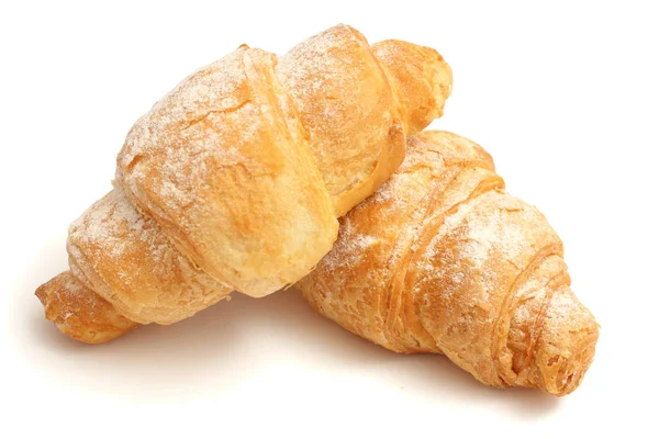 Croissant fresco isolato su bianco — Foto Stock