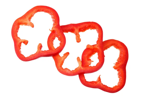 Φέτες κόκκινου γλυκού πιπεριού που απομονώνονται σε λευκό φόντο. πάνω όψη — Φωτογραφία Αρχείου