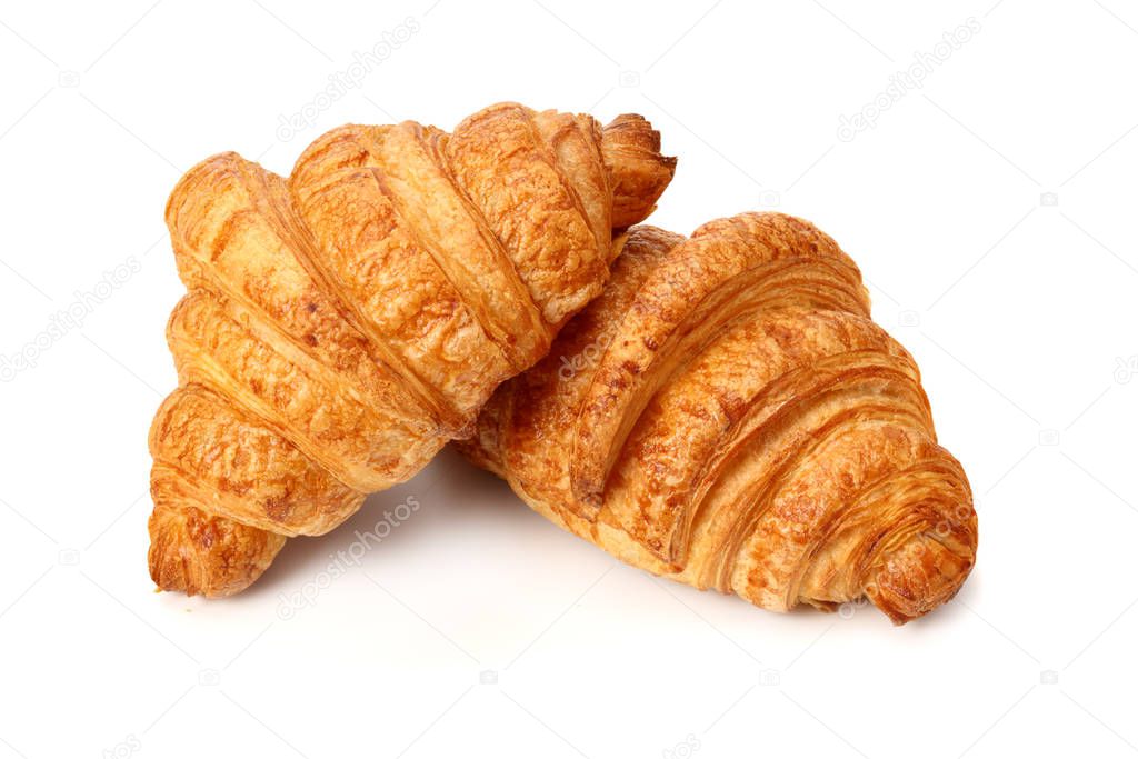 two fresh croissants isolated on white background 