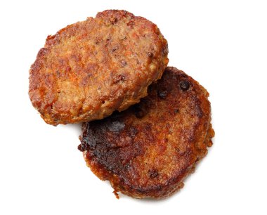 Beyaz arka planda taze ızgara hamburger eti. en üstteki görünüm