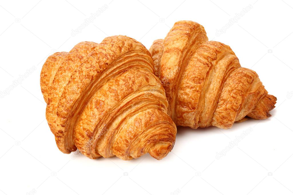 two fresh croissants isolated on white background