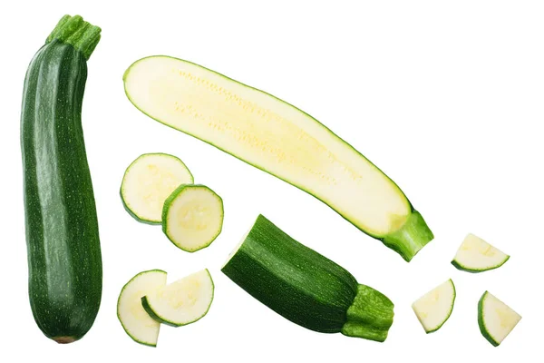 Verse Groene Courgette Met Plakjes Geïsoleerd Witte Achtergrond Bovenaanzicht — Stockfoto