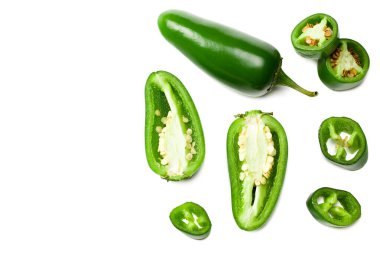 sliced jalapeno peppers isolated on white background. Green chili pepper. Capsicum annuum. top view clipart