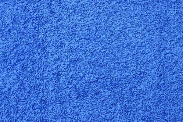 Blue beach towel texture. Blue beach towel background. Top view.