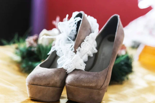 wedding garter and wedding shoes
