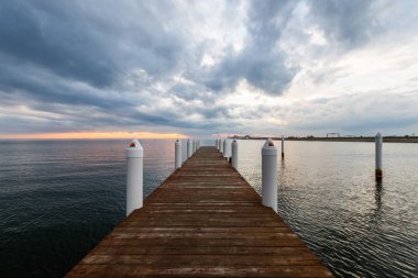 Hemingway Pier Next to the Bay Bridge outside of Annapolis Maryl clipart