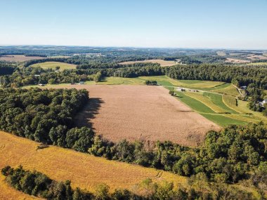 Aerial of New Freedom and surrounding Farmland in Southern Pennsylvania during Fall clipart