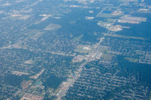 Metropolis Area of Houston, Texas Suburbs from Above in an Airplane