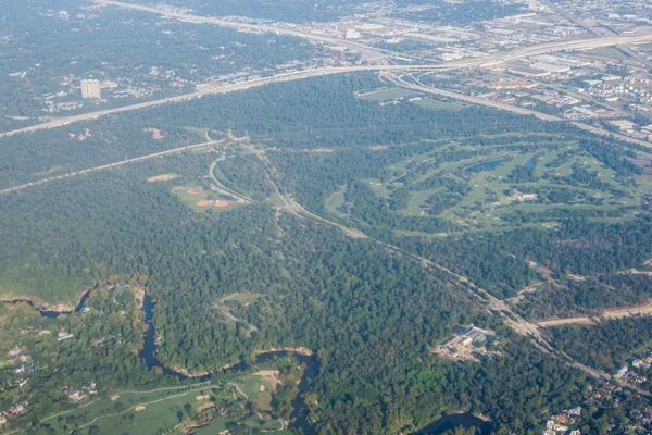 Metropolis Area of Houston, Texas Suburbs from Above in an Airplane