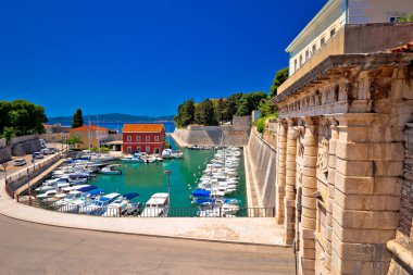 Zadar city gate and Fosa harbor view clipart