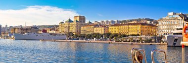 City of Rijeka waterfront boats and architecture panoramic view clipart