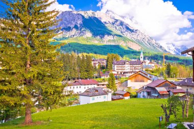Alpine town of Cortina d' Ampezzo in Dolomites Alps view clipart