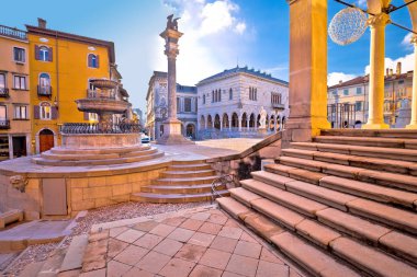 Ancient Italian square arches and architecture in town of Udine clipart