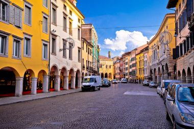 Colorful street in Udine landmarks view clipart