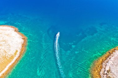 Archipelago of Croatia speed boat on turquoise sea, stone desert clipart