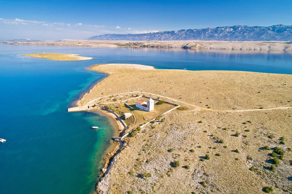 Stone desert island of Zecevo church aerial view — Stock Photo, Image