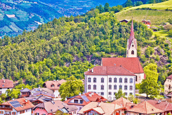 Dolomites. Idyllic alpine village of Gudon architecture and landscape view, Bolzano province in Trentino Alto Adige region of Ital