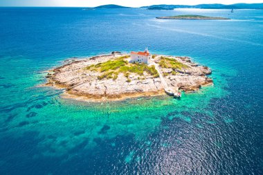 Aerial view of lonely island with lighthouse, Korcula riviera of Croatia, island Vela Sestric clipart