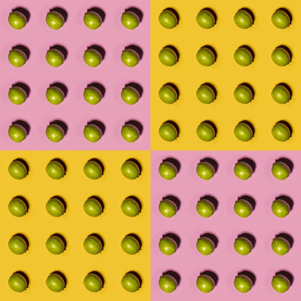 Limes Pattern Yellow Pink Background Creative Food Concept Flat Lay — Stock Photo, Image