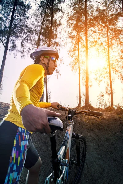 Young man and mountain bicycle against sun light for people spor — Stock Photo, Image