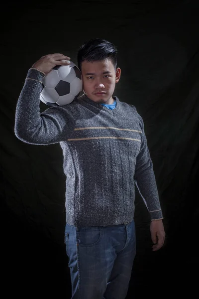 Asian soccer mania man on black — Stock Photo, Image