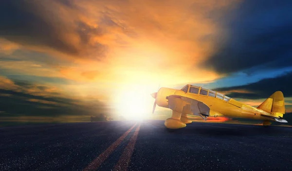 Stary żółty Śmigłowa powierzchnia na pas startowy lotniska z zachód słońca niebo bac — Zdjęcie stockowe