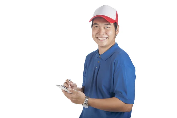 Rosto sorridente de dente do homem de entrega e computador inteligente na mão p — Fotografia de Stock