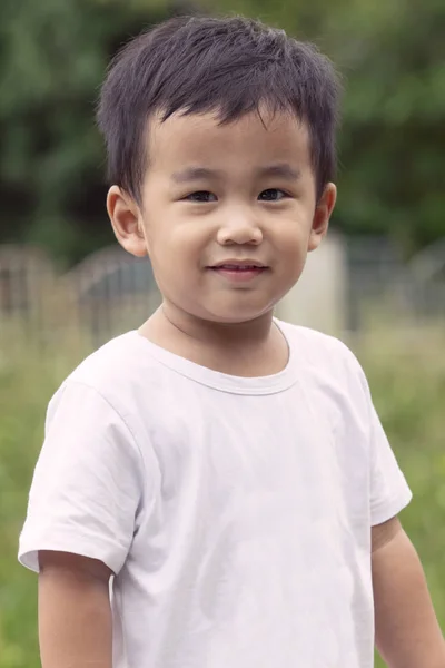 Outdoor portrait head shot of asian children smiling face  looki — Stock Photo, Image