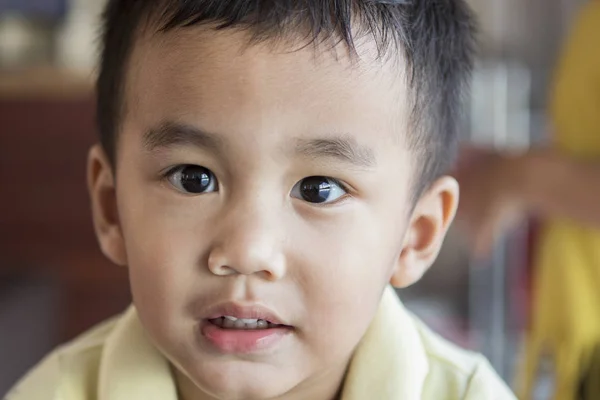 Close up eyes looking to camera and face of one year old asian t — Stock Photo, Image