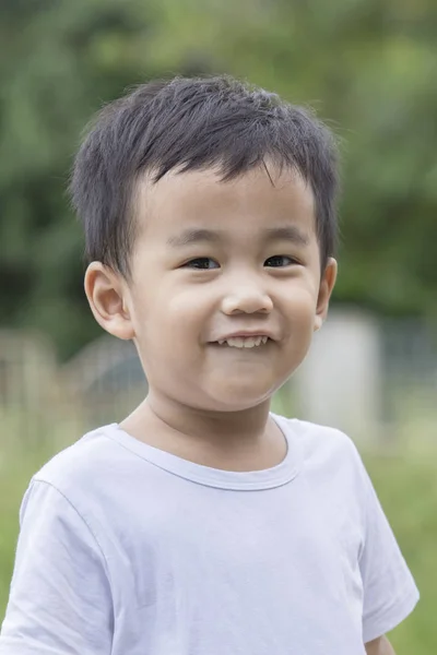 Poratriat head shot of toothy smiling face of asian 1 year old c — Stock Photo, Image