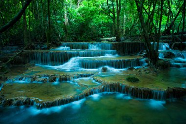 hauy mae kamin waterfalls in kanchaburi thailand clipart
