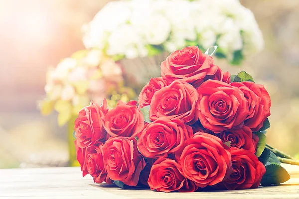 Close up beautiful red roses bouquet cinema color process style — Stock Photo, Image