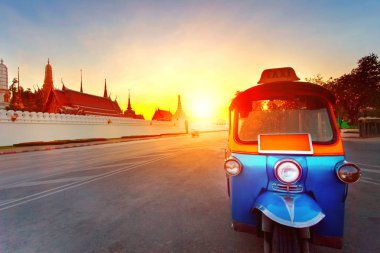 tuk tuk and sun set sky at grand palace most popular traveling d clipart