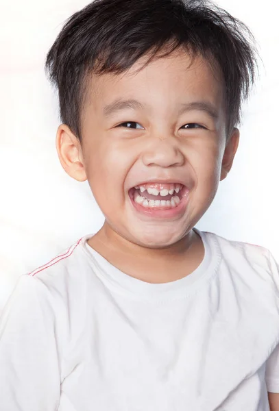 Vicino fino testa colpo di asiatico bambini dentino sorridente faccia — Foto Stock