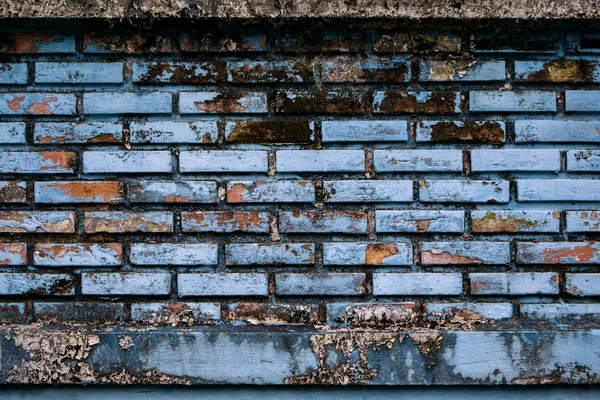 Staré modré výstřední cihlová zeď použít jako pozadí — Stock fotografie