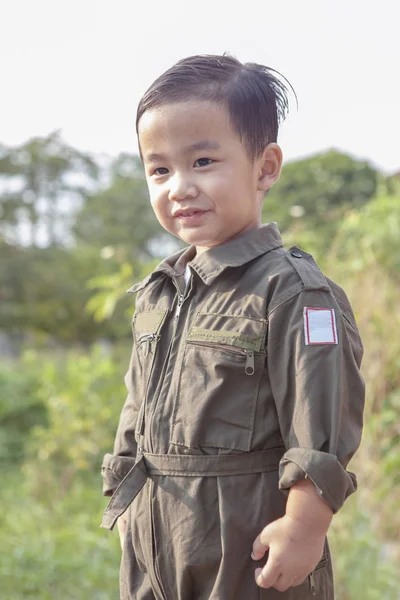 Portrait of asian children wearing airforce pilot suit toothy sm — Stock Photo, Image