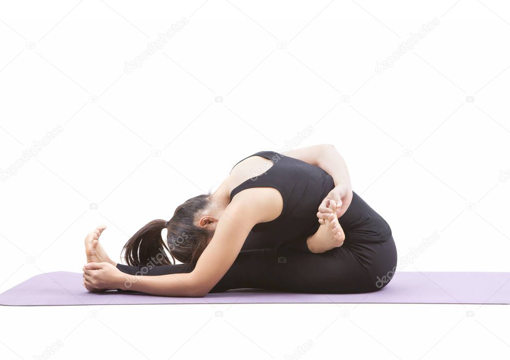 woman playing yoga on purple mat isolated white background
