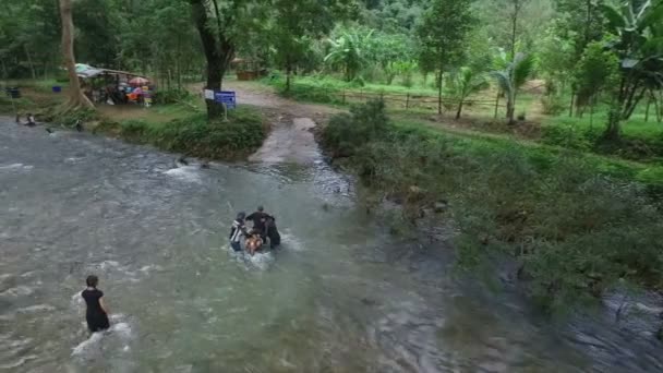 Motorcycle Crossing Flowing River — Stock Video
