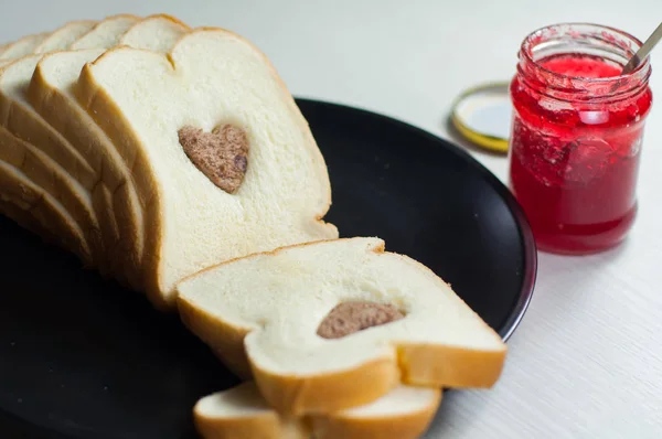 Photo love delicious slice of bread — Stock Photo, Image