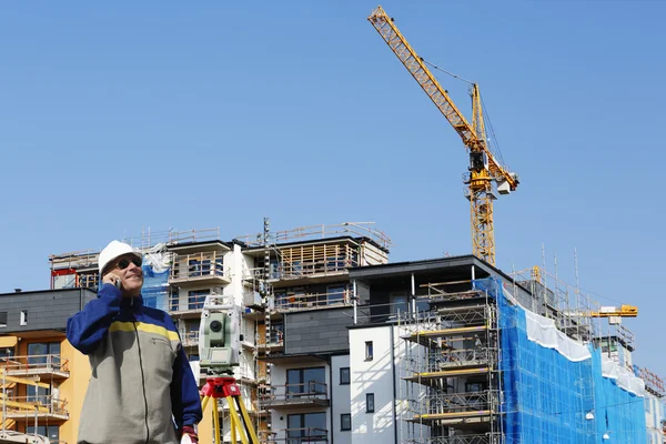 Landmeten en instrument en bouw Rechtenvrije Stockfoto's