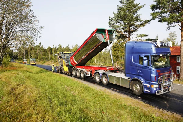 Trucks and steamrollers — Stock Photo, Image